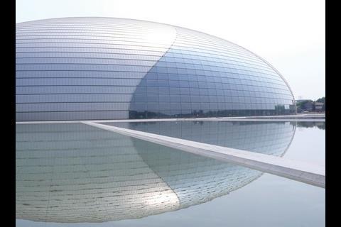 China’s £254 Grand National Theatre rises like an egg out of an ornamental pool